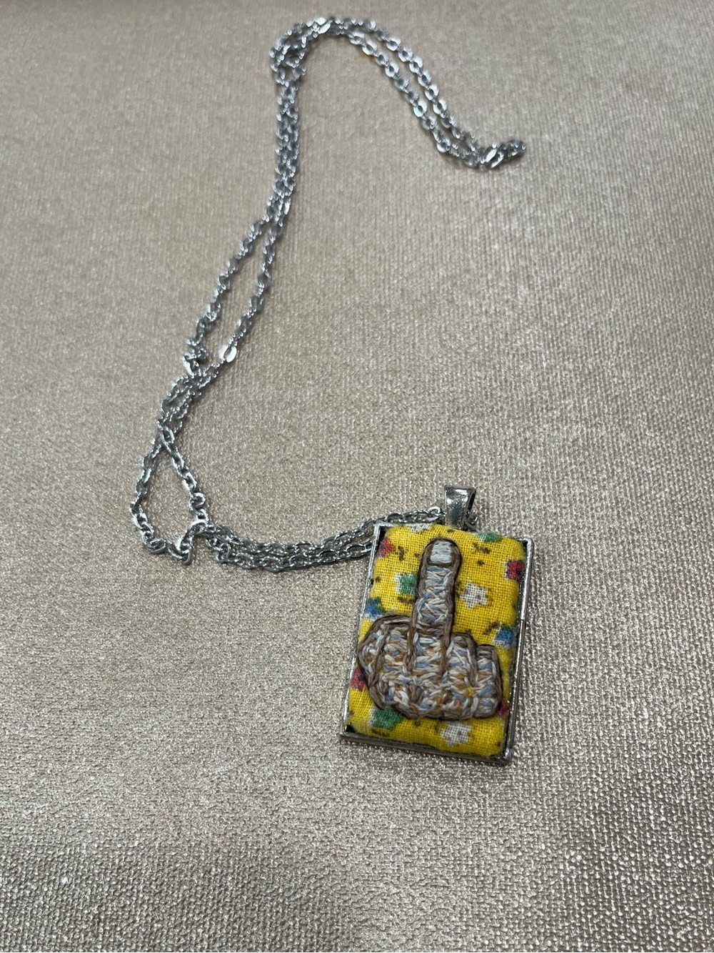 Middle finger hand embroidered pendant and necklace